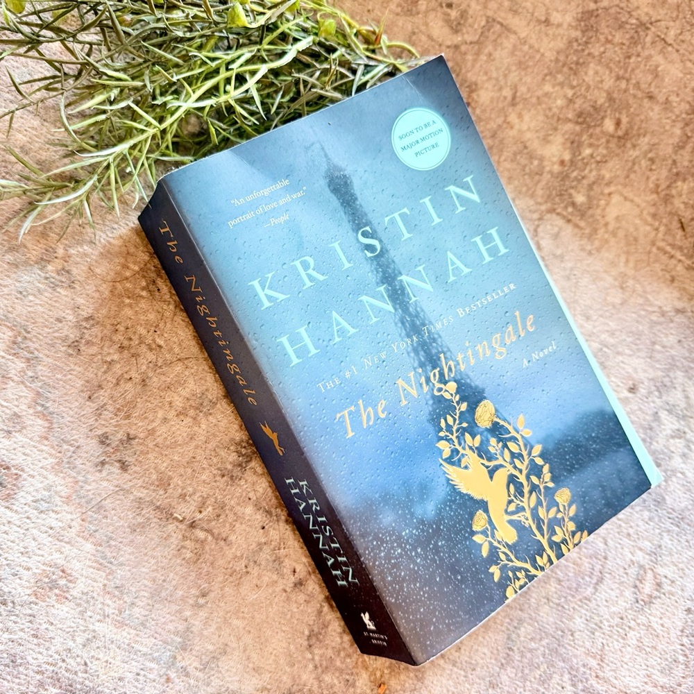 The Nightingale by Kristin Hannah - Black and Gold paperback